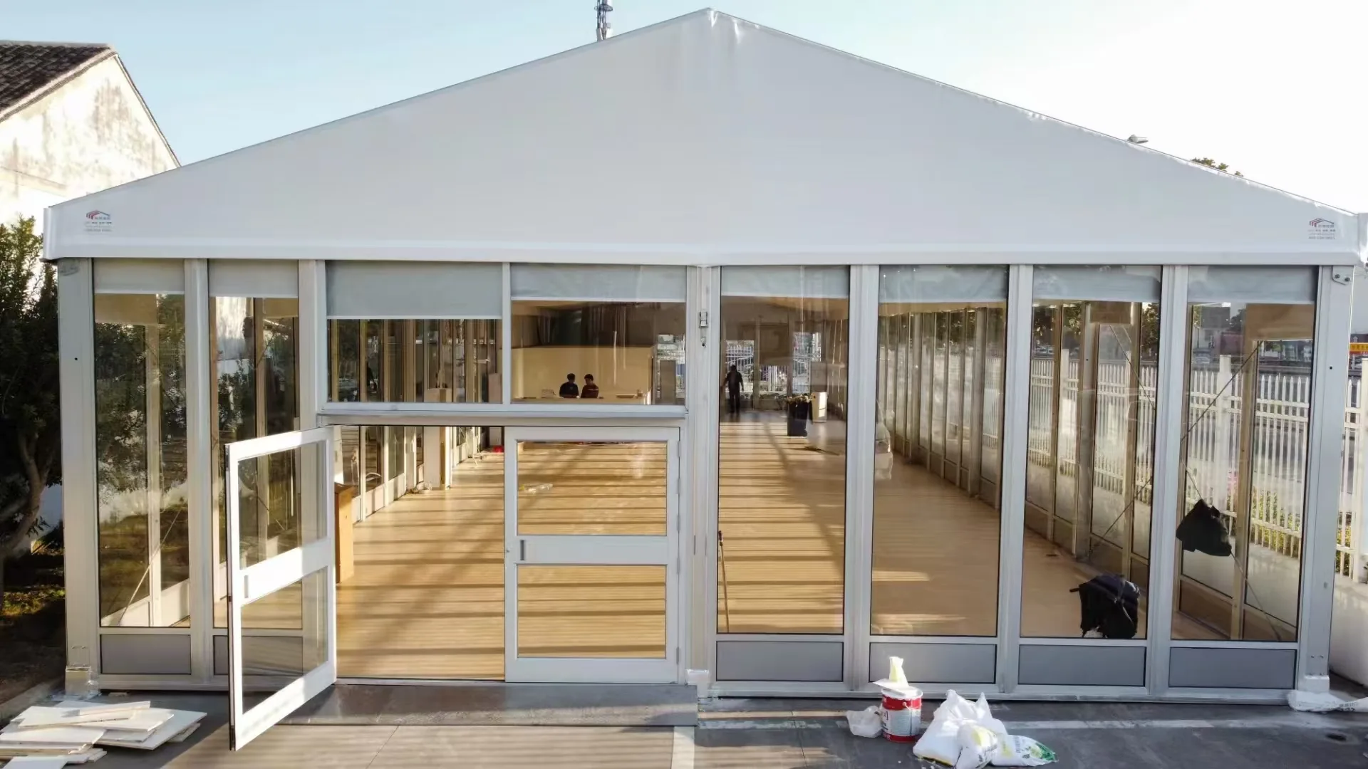 Glass-wall tent used for an auto event
