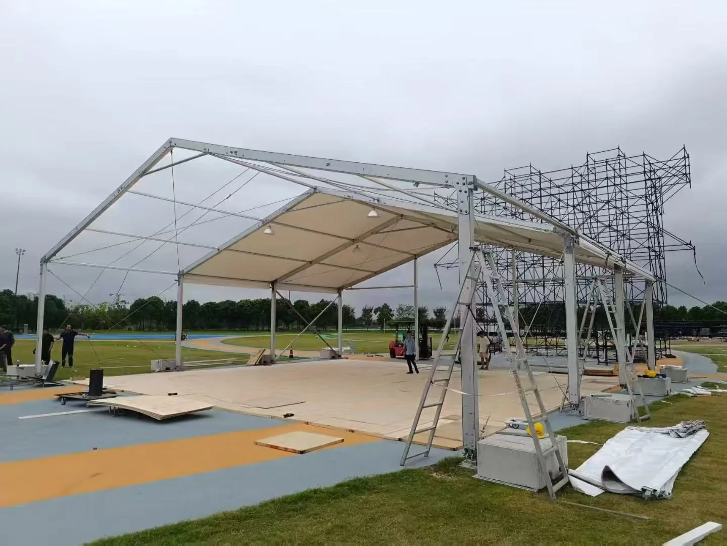 Tent frame installation at an event site